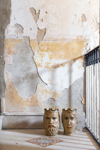 Teste di Moro decorative head sculptures styled in rustic interior setting