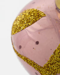 Close-up of the gold glitter detail on a House Doctor Amore pink glass bauble