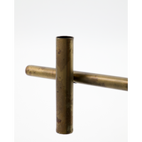 close-up of House Doctor antique brass candle holder showing aged patina and metal texture