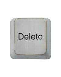 House Doctor Delete key wall art, an off-white ceramic keyboard button with black lettering