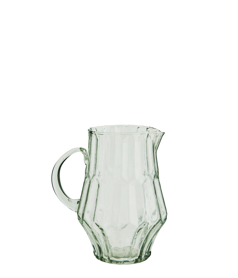  clear handcrafted glass jug with faceted shape and curved handle
