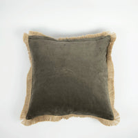 Julie cushion by Olsson & Jensen showing the olive green side with jute fringe