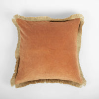 Julie cushion by Olsson & Jensen showing the rust side with jute fringe