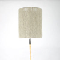 Juni beige mohair cylinder lamp shade by Olsson & Jensen on a lamp base