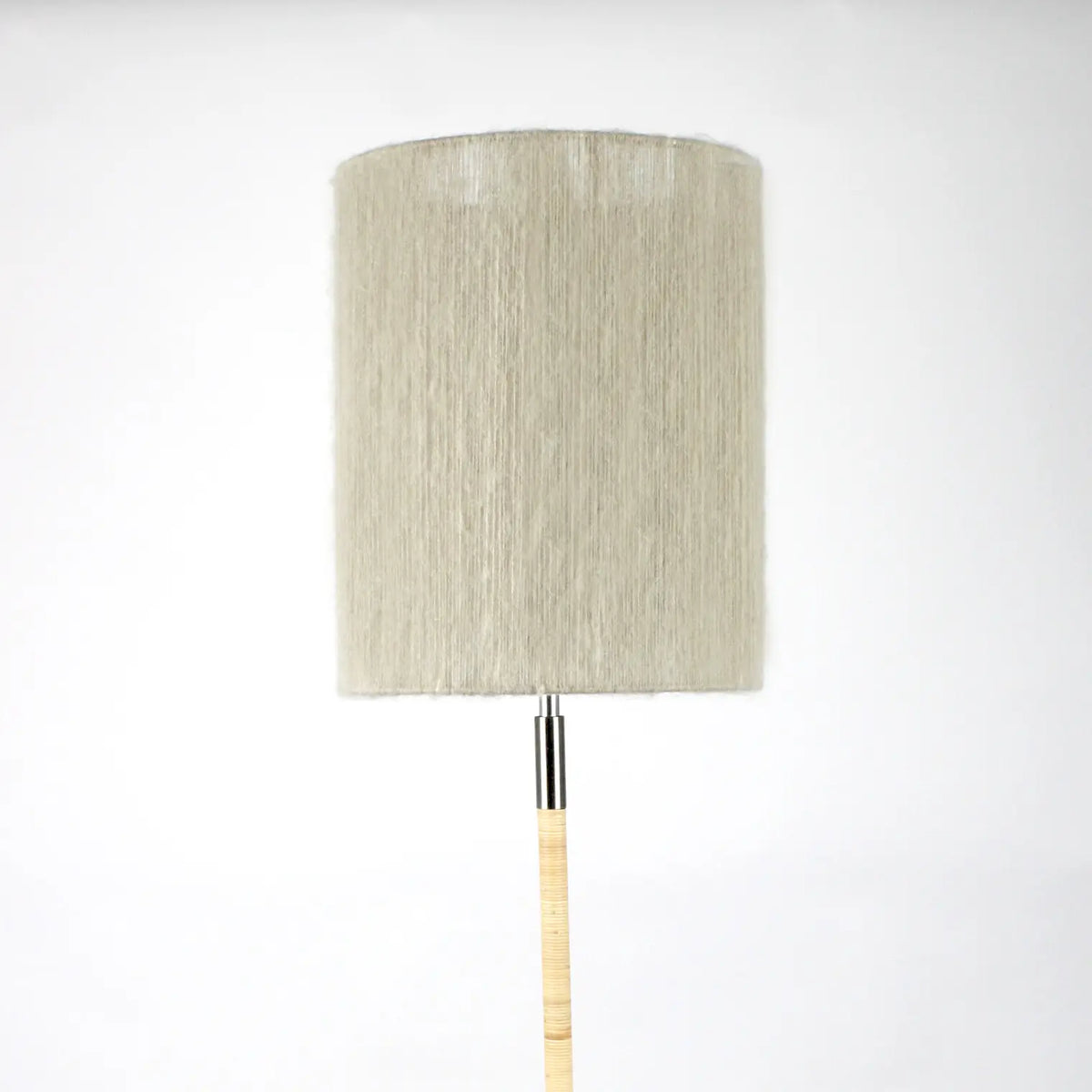Juni beige mohair cylinder lamp shade by Olsson & Jensen on a lamp base