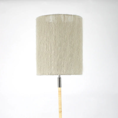 Juni beige mohair cylinder lamp shade by Olsson & Jensen on a lamp base