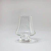 Kajo clear glass on foot by Olsson & Jensen on a white background