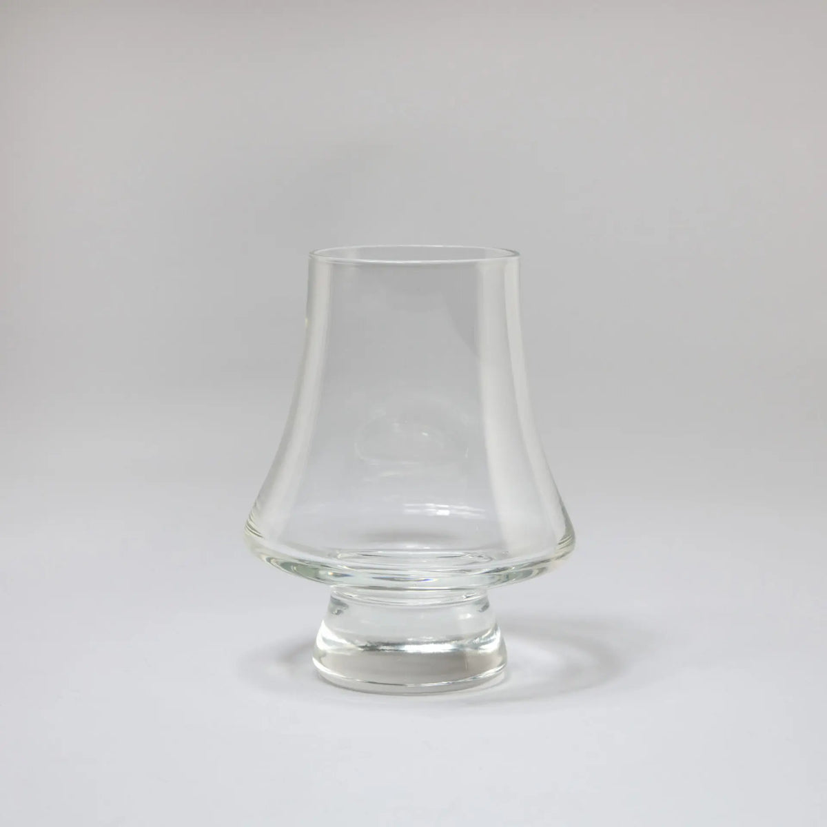 Kajo clear glass on foot by Olsson & Jensen on a white background