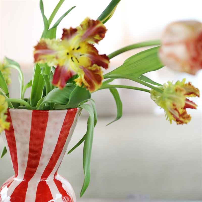 close-up rim detail of &K candy-stripe vase showing hand-painted brush marks
