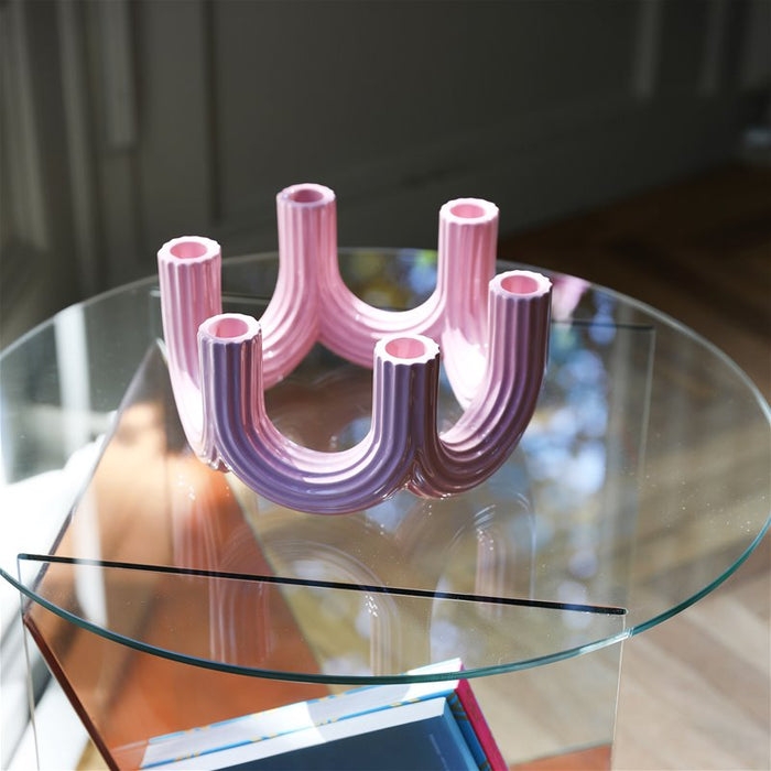 pink churros candle holder by &klevering styled on a glass side table in natural light

