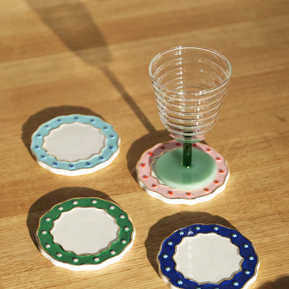 green goblet mingle glass by &klevering showing ribbed glass and green stem detail