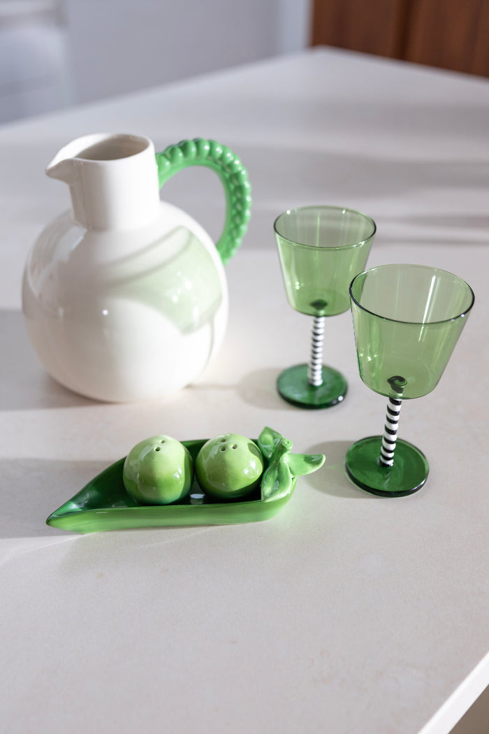 &klevering pea pod salt and pepper set styled on a light kitchen worktop at north home
