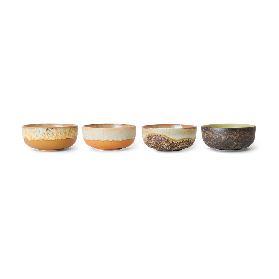 The full set of four HKLIVING Drift tapas bowls lined up on a plain white background, showing the range of natural, coastline-inspired glazes