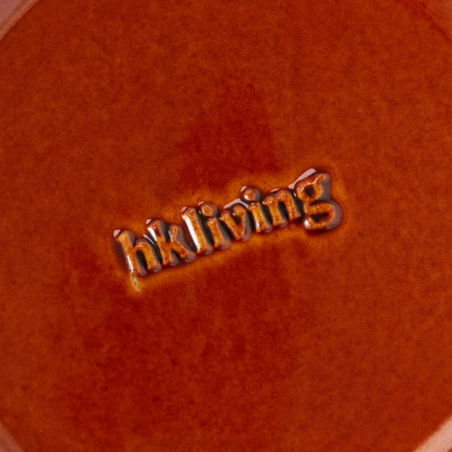 Close-up of the embossed hkliving stamp on the base of a Drift tapas bowl
