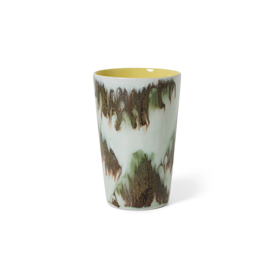 Studio shot of the HKLIVING Tide tea mug on a white background, showing its mint-white glaze with olive-brown drip detailing and yellow interior