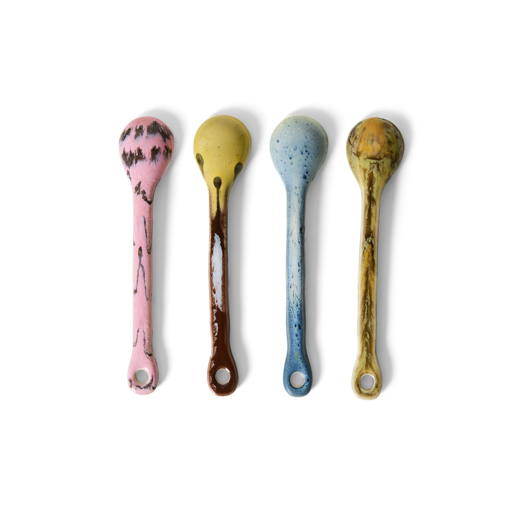 Close-up of the bowls of the HKLIVING Sketch spoons, set of 4, showing the varied pink, yellow, blue and brown glazes