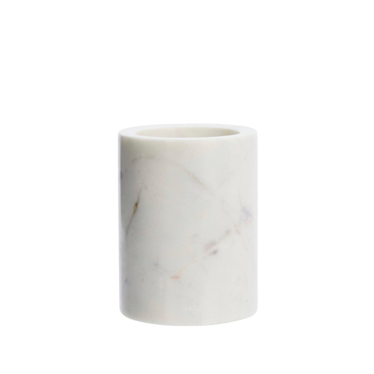 white round marble jar on white background showing natural veining
