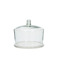 clear glass display dome with white marble base
