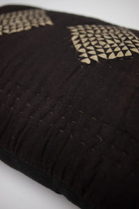 Corner detail of the Leyla black patterned cushion by Olsson & Jensen