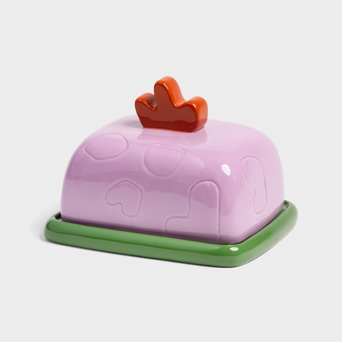 Lilac &Klevering butter dish with red sculptural handle and green base adding instant cheer to breakfast.