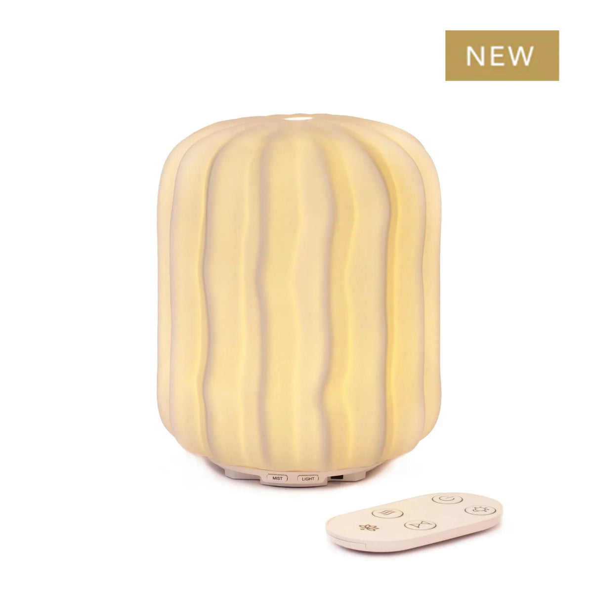 organic shell-shaped ceramic aroma diffuser with soft ambient light