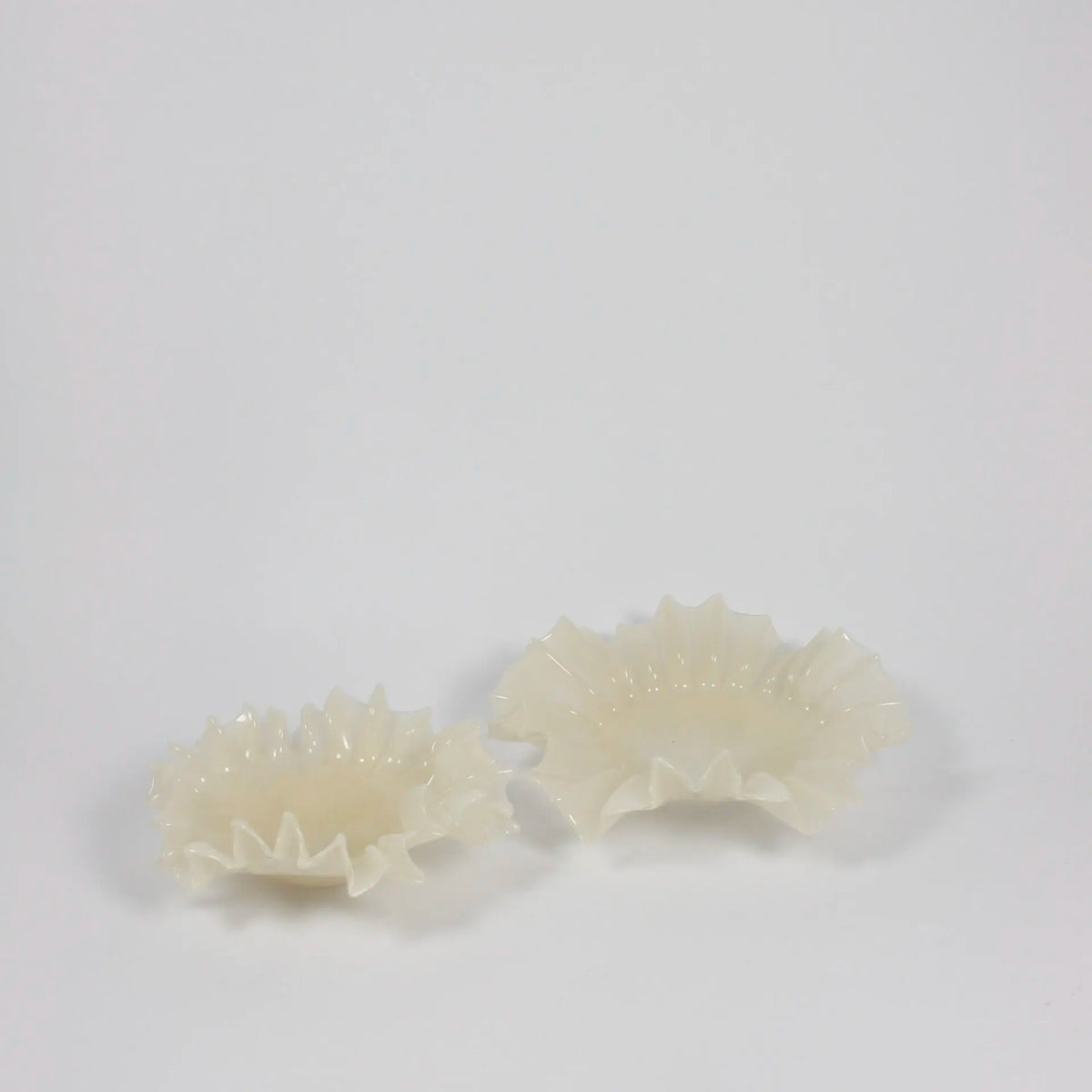 Pair of vanilla Loa glass bowls by Olsson & Jensen