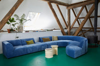 Compact stoneware table as a focal point in stylish home