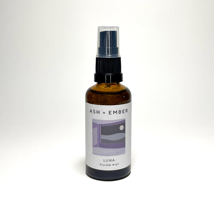 Luna Pillow Mist by Ash + Ember in amber glass bottle with lavender and clary sage scent