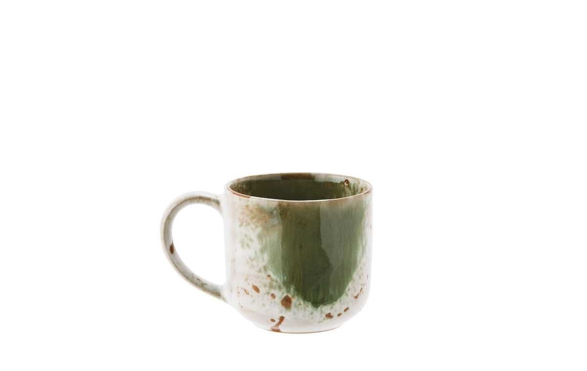white and green stoneware mug with unique reactive glaze finish
