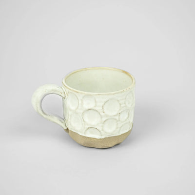 Maja white textured ceramic mug with reactive glaze by Olsson & Jensen