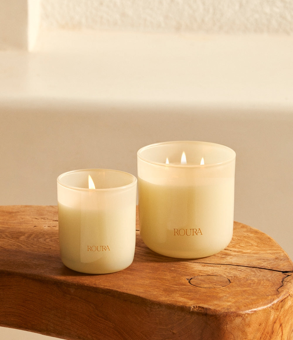 Majestic Lotus candles burning in two sizes with lotus and jasmine scent