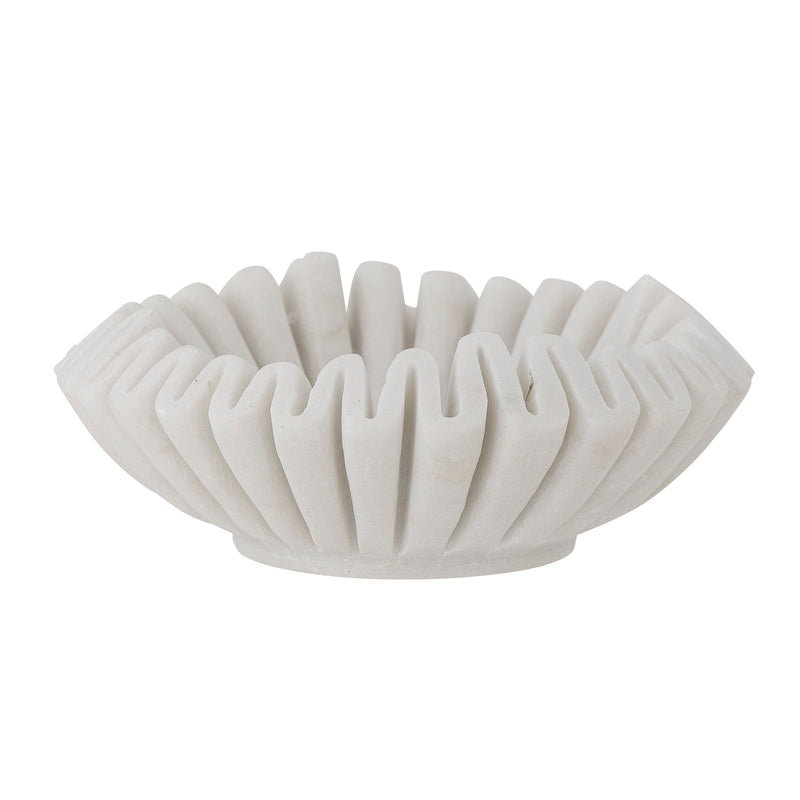 side view of white decorative wave form marble bowl