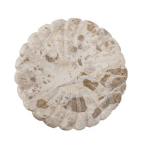 Polished marble platter with natural stone variations and organic shape