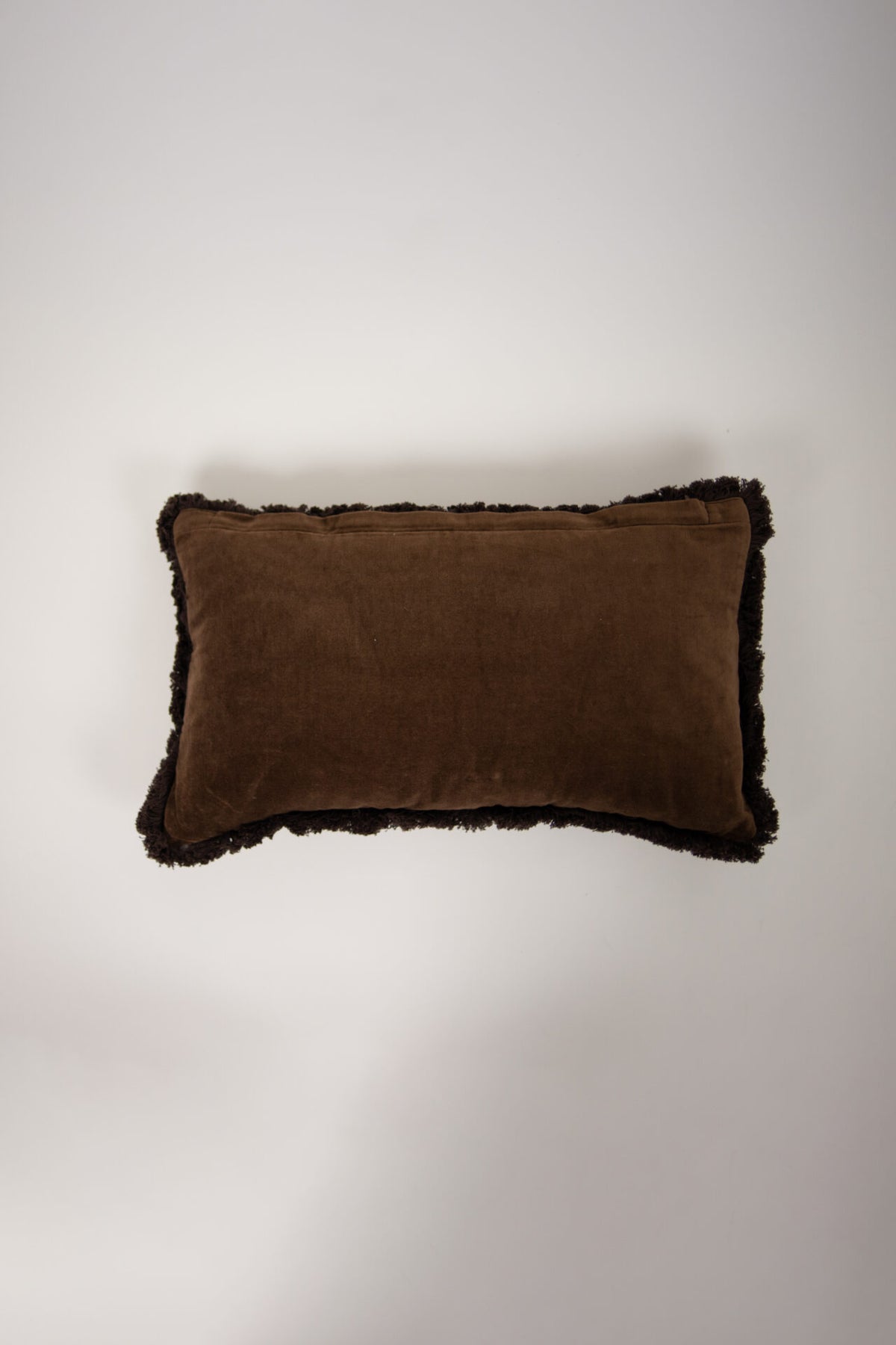 Plain brown reverse of the Maribel cushion by Olsson & Jensen