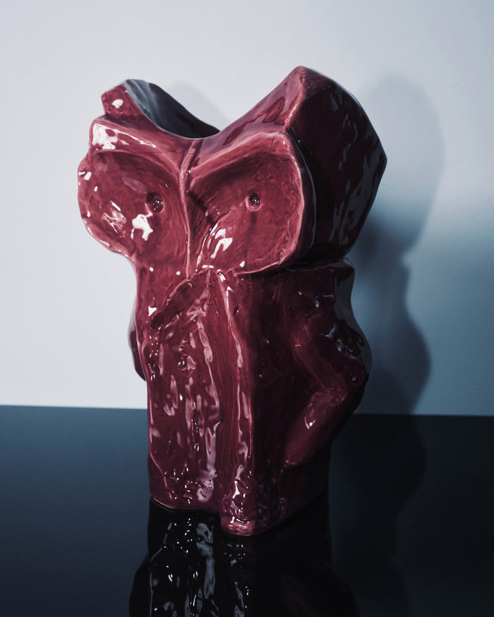 Designer aubergine owl vase as a sculptural statement piece by Marni