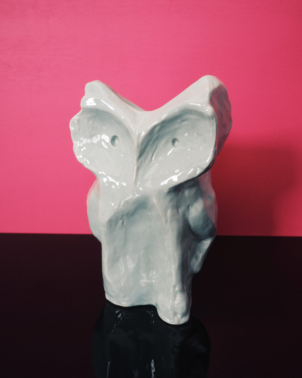 Whimsical small owl vase with sculptural form in pale blue-green glaze