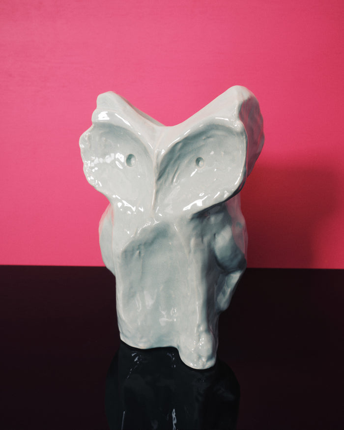 Whimsical small owl vase with sculptural form in pale blue-green glaze