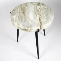 Marwin side table by Olsson & Jensen with a white and sand marble top and black legs