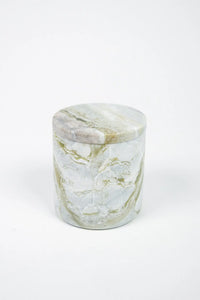Mauro blood orange and grapefruit candle in a green marble holder by Olsson & Jensen