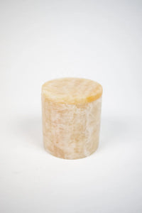 Mauro cashmere candle in a beige marble holder by Olsson & Jensen