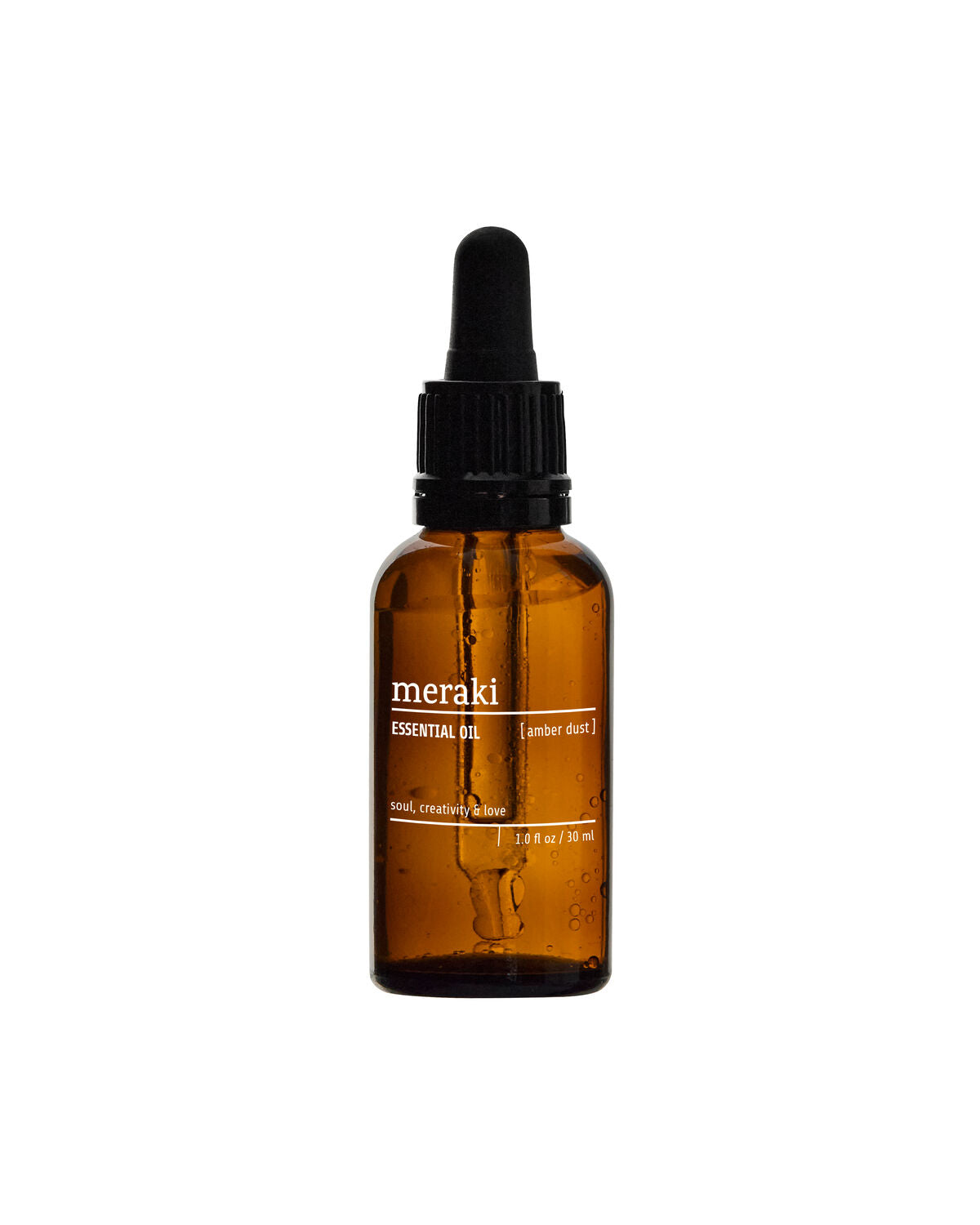 Meraki Amber Dust essential oil in a 30ml amber glass dropper bottle