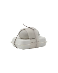 Meraki eucalyptus stone scrub set, grey scrub stone and soap tied with cord in a white tray