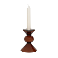 Mesi brick glass candle holder with an ivory dinner candle