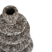 Close-up of the speckled charcoal reactive glaze on the Milo candle holder