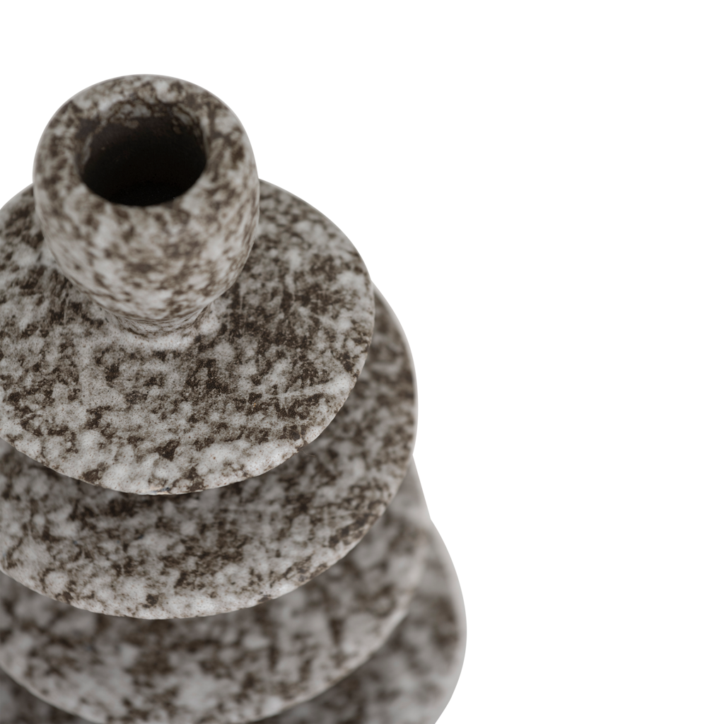 Close-up of the speckled charcoal reactive glaze on the Milo candle holder