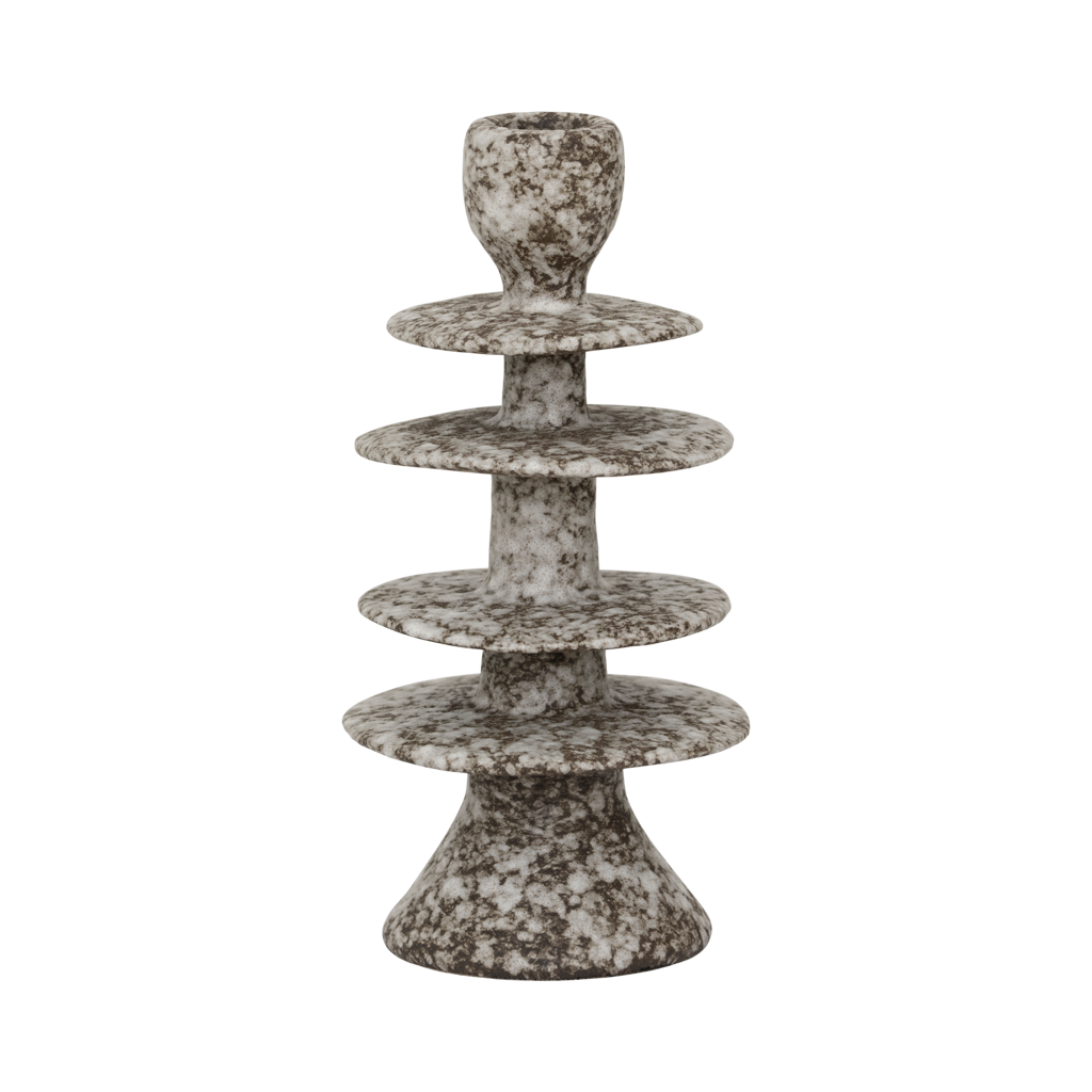 Milo candle holder from the side, showing its irregular stacked discs