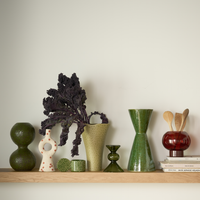 Urban Nature Culture vases and candle holders on a wooden shelf