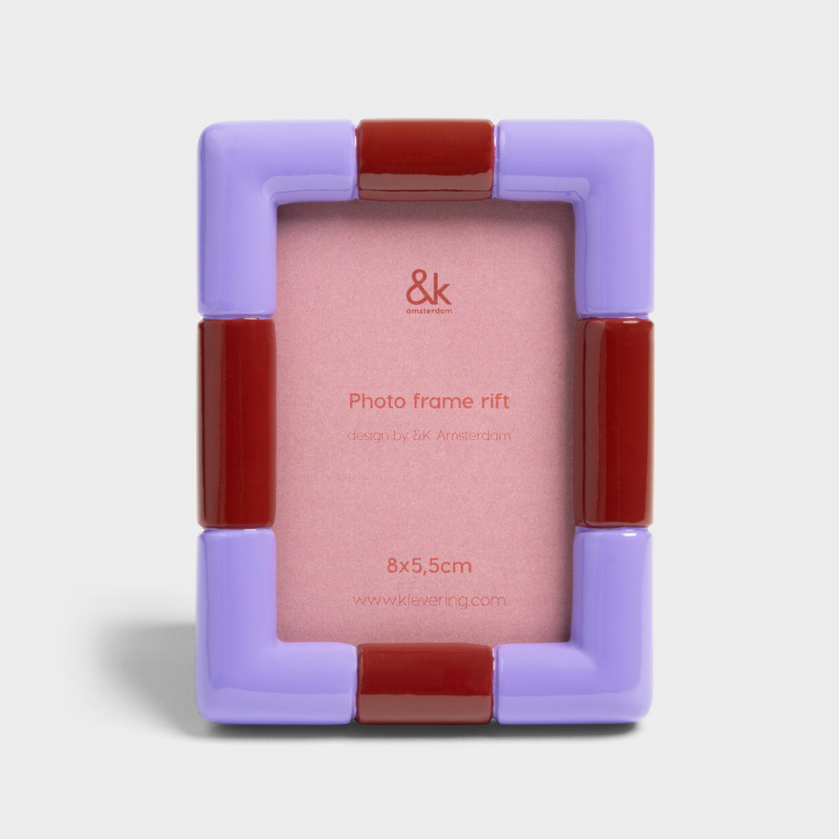 Modern lilac and red rectangular picture frame for 8 x 5.5 cm prints.
