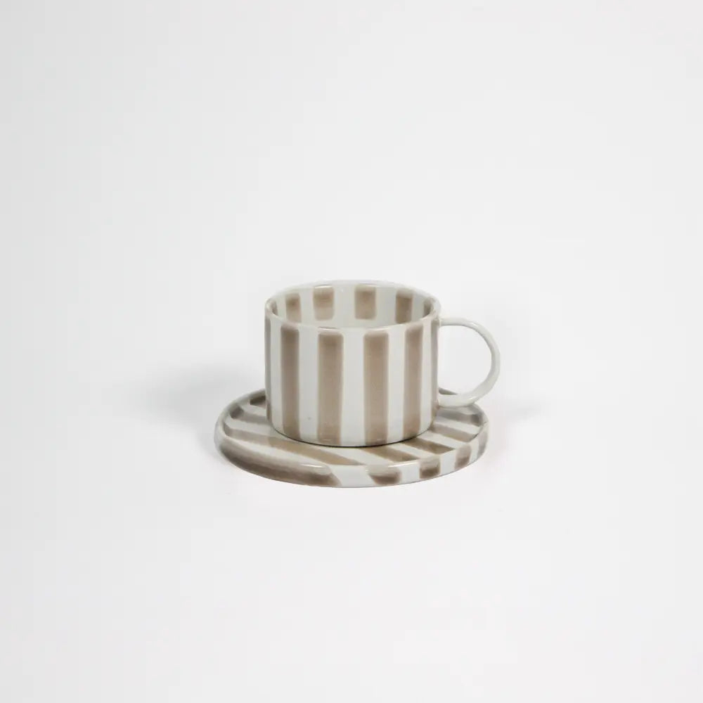 Monica beige striped stoneware cup and saucer by Olsson & Jensen