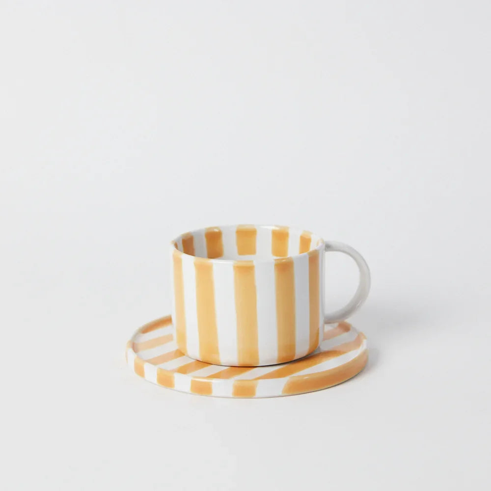 Monica yellow striped stoneware cup and saucer by Olsson & Jensen